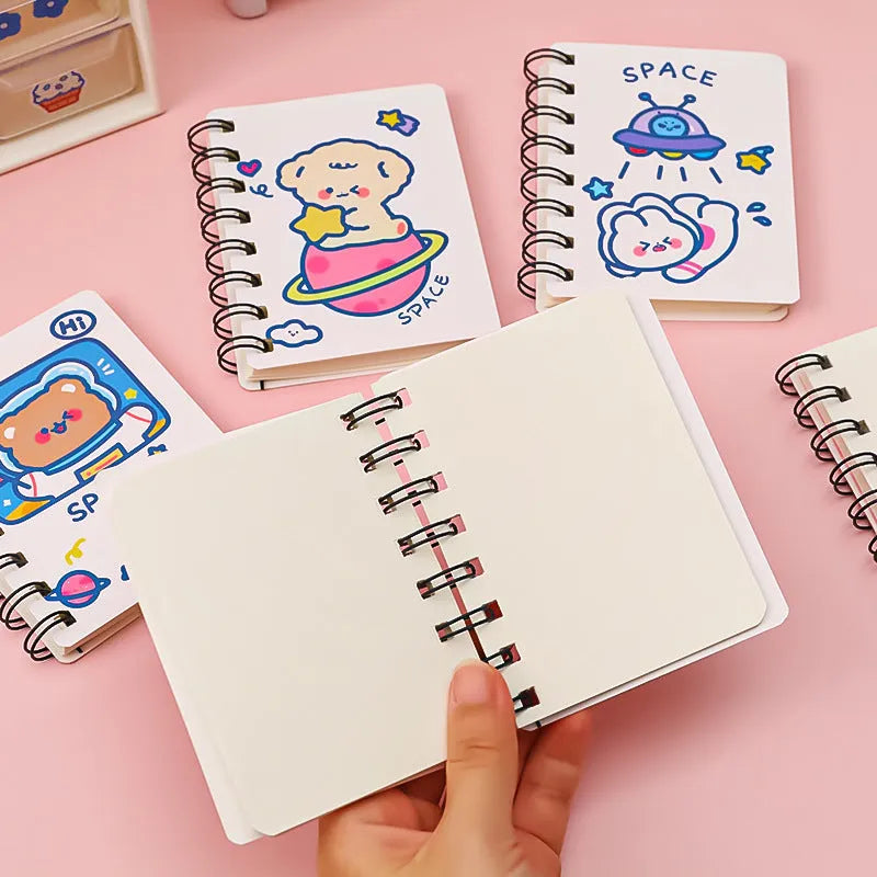 Astronaut-themed pocket flipper notebook measuring 10.5 by 8 centimetres