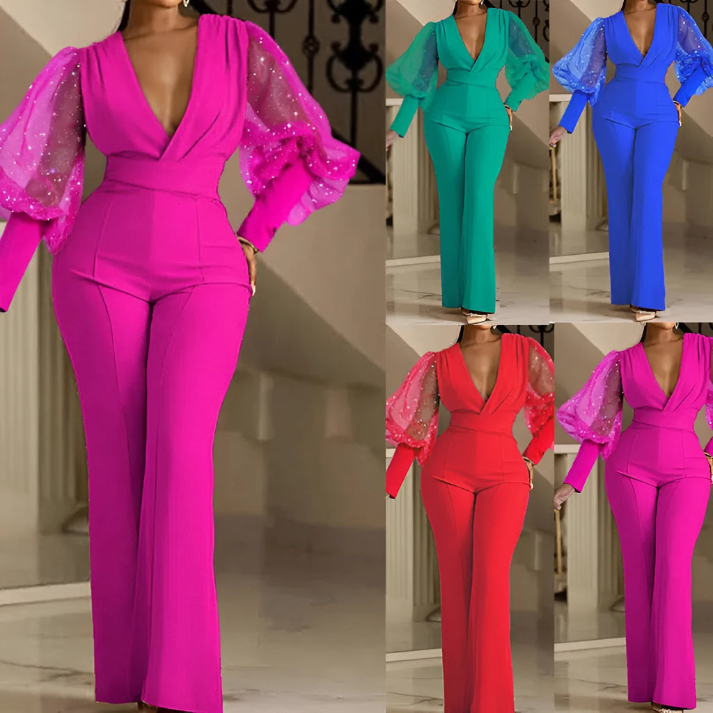 Red women's jumpsuit with mesh-stitch long sleeves, elastic waist, and wide-leg trousers on a model.