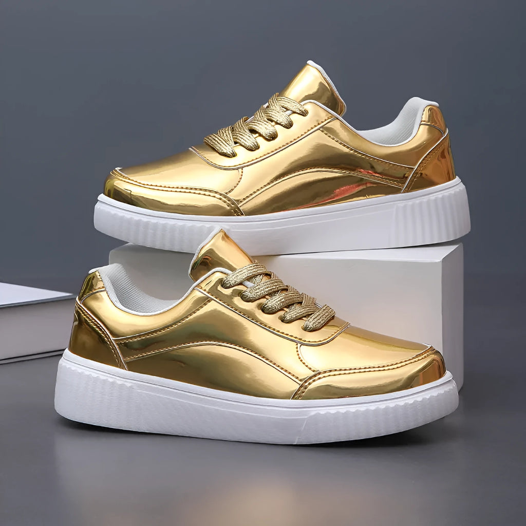Rose gold sequin platform sneaker with thick sole and round toe on a white background.