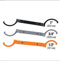 Orange, grey, and black crescent wrenches from a three-piece magnetic suction set for catheter locking.