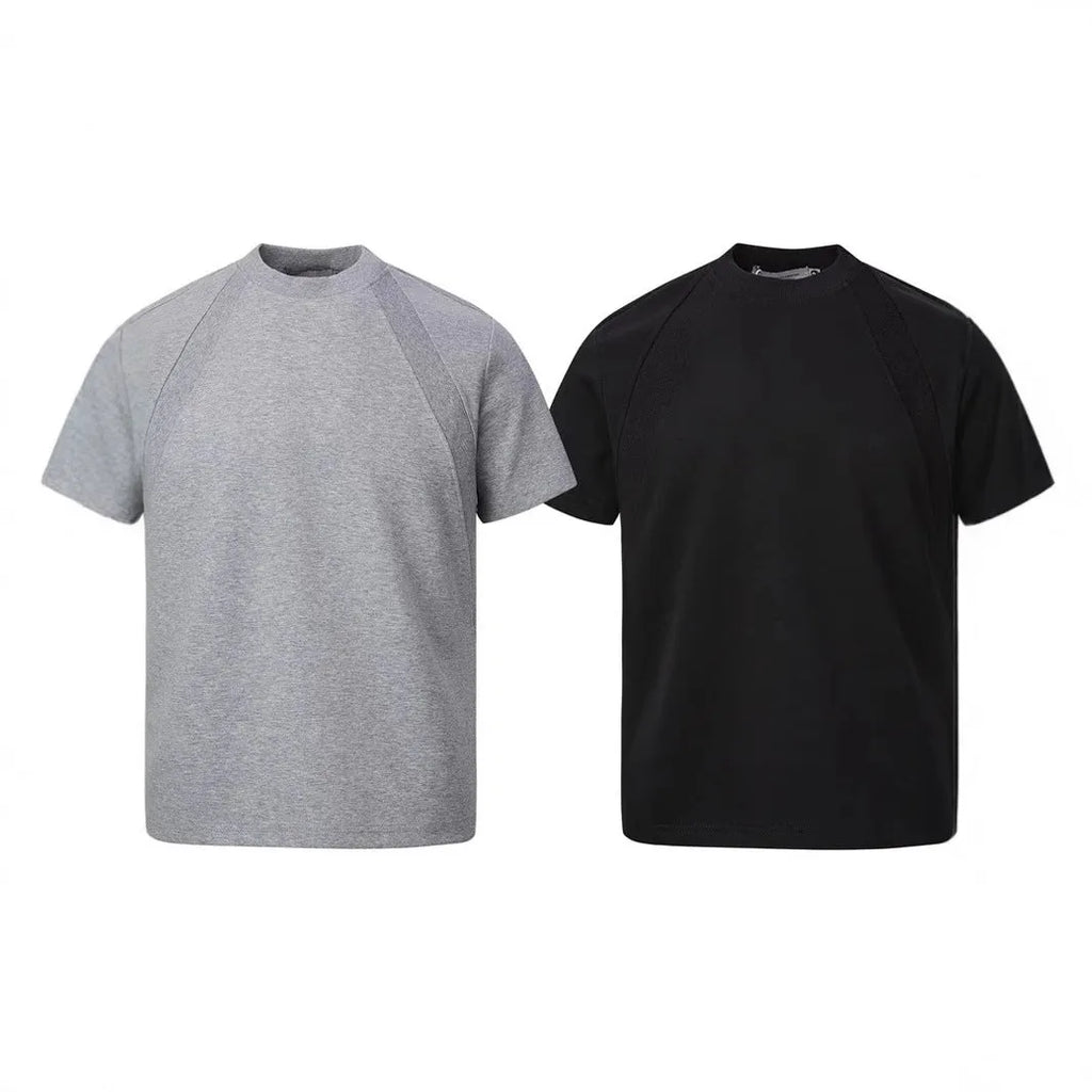 Loose grey short sleeve top with air layer stitching on a hanger.