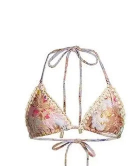Women's floral bikini swimsuit set with top, briefs, and skirt in creamy-white beige colour
