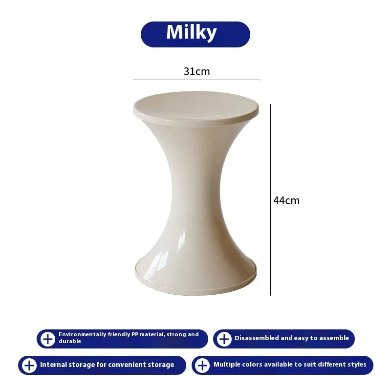 Plastic hourglass-style shoe changing stool shown in one of five colour options.