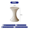 Plastic hourglass-style shoe changing stool shown in one of five colour options.