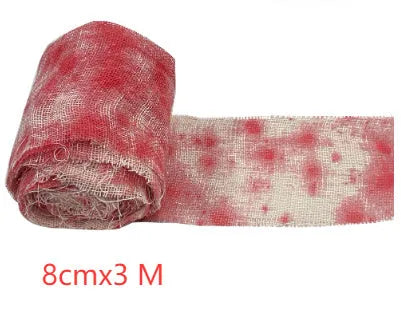 Halloween bloody horror bandage in red colour with 8cm width on a roll for spooky decorations