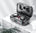 Black Bluetooth gaming headset with charging case showing earplug style design and mobile phone charging capability