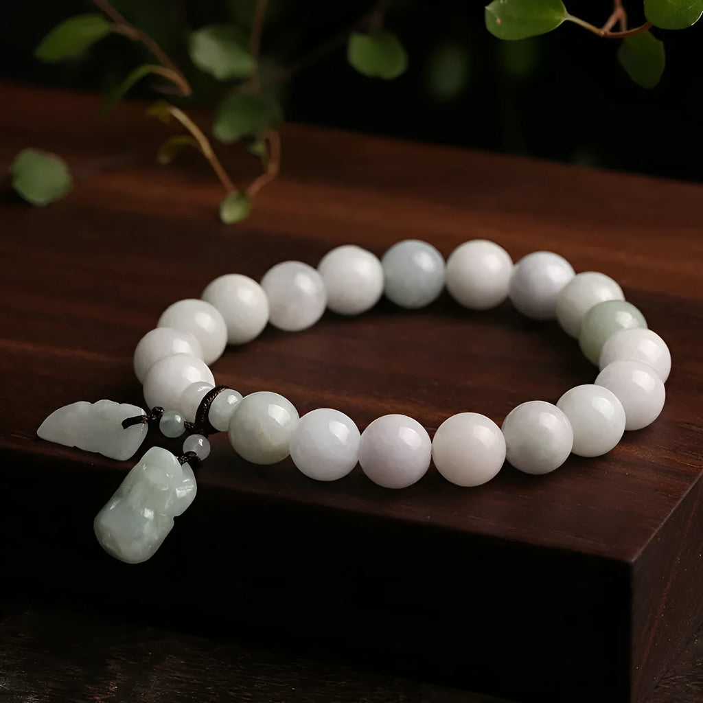 Natural emerald jade bracelet with geometric beads and Maitreya Buddha hanging pendant
