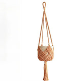 Hand-woven polyester cotton flower pot in brown colour displaying textured weave pattern