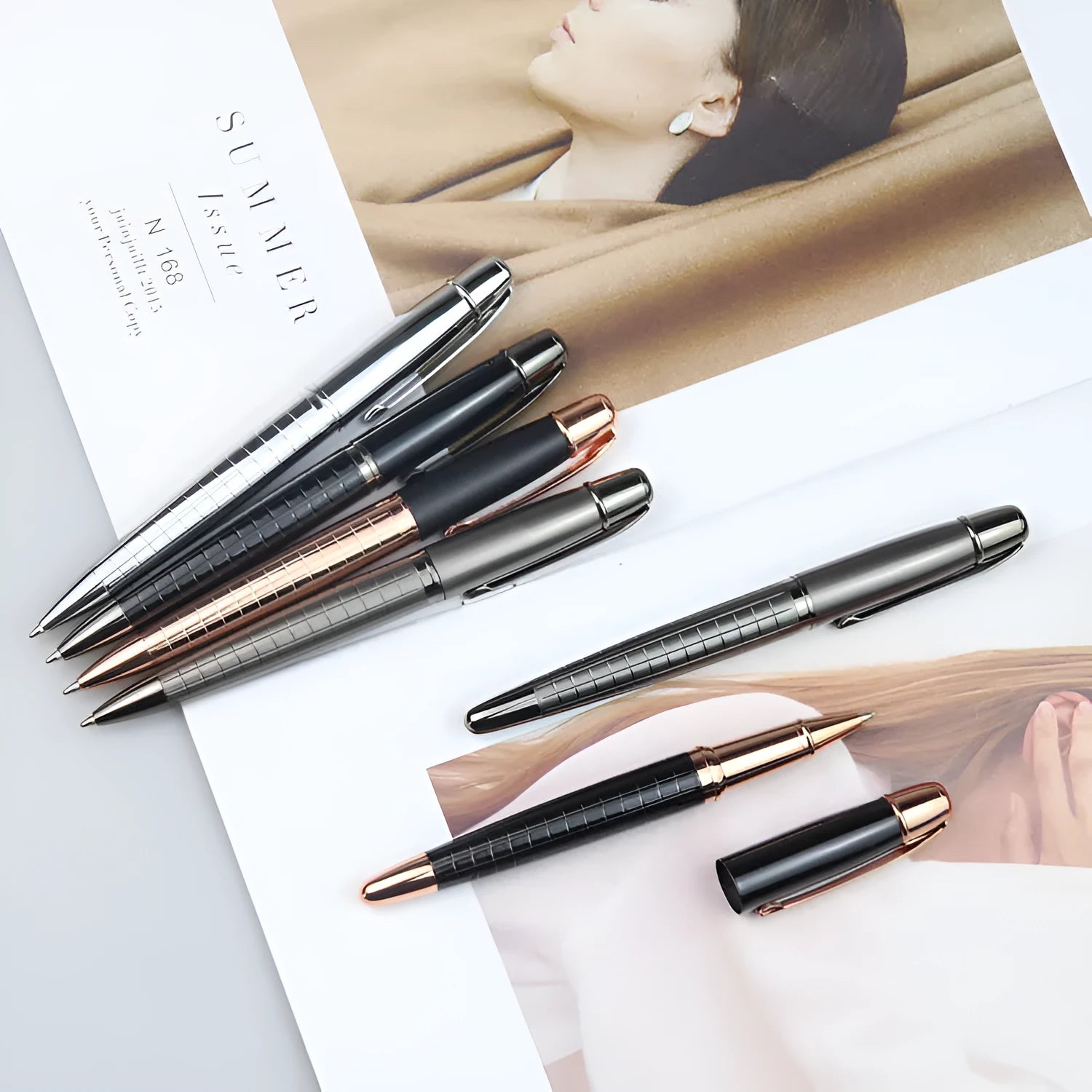 Gun gray metal roller pen showing 13.5cm length with black or blue ink refill options