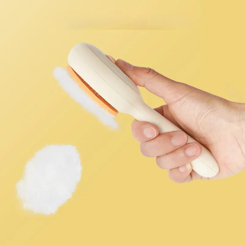 Green and yellow stainless steel pet grooming brush with a non-slip handle for hair removal.