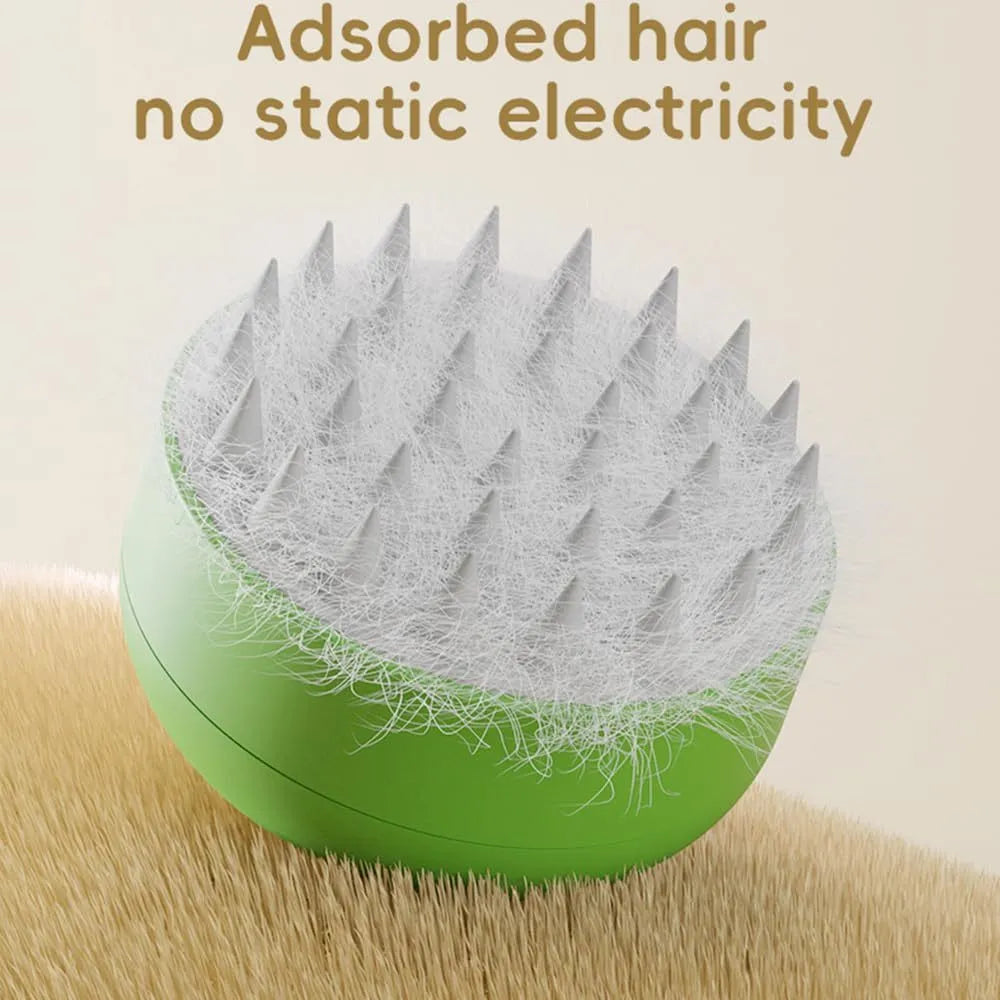 Rechargeable cat steam brush with green silicone bristles and ergonomic handle