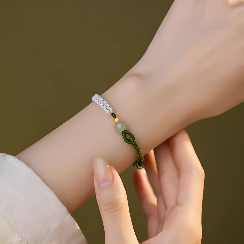 Hetian jade bracelet with sterling silver carrying strap on cord band in national fashion style
