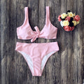 Women's pure colour bikini swimsuit in polyester fabric showing colour options