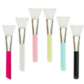 Reusable silicone face and body mask applicator spatula in various colours.