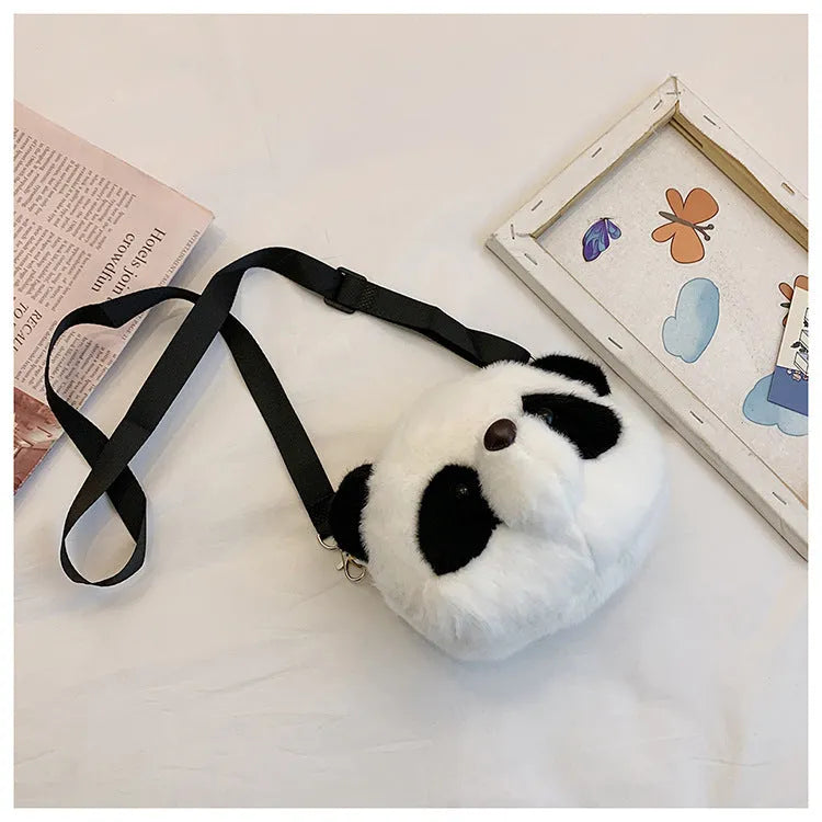 Plush panda head design crossbody bag showing cylindrical shape and sandwich pocket