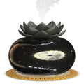 Pure black lotus-shaped aromatherapy humidifier with ceramic top and USB cable