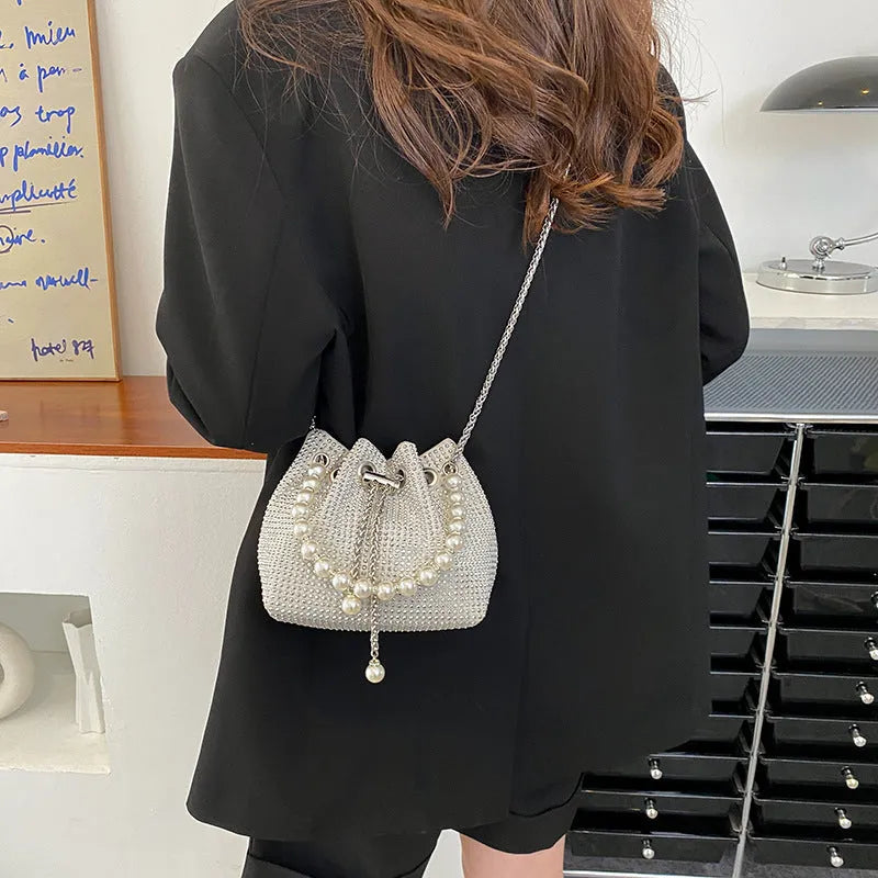 Western style diamond crossbody bag with chain strap in bucket shape design