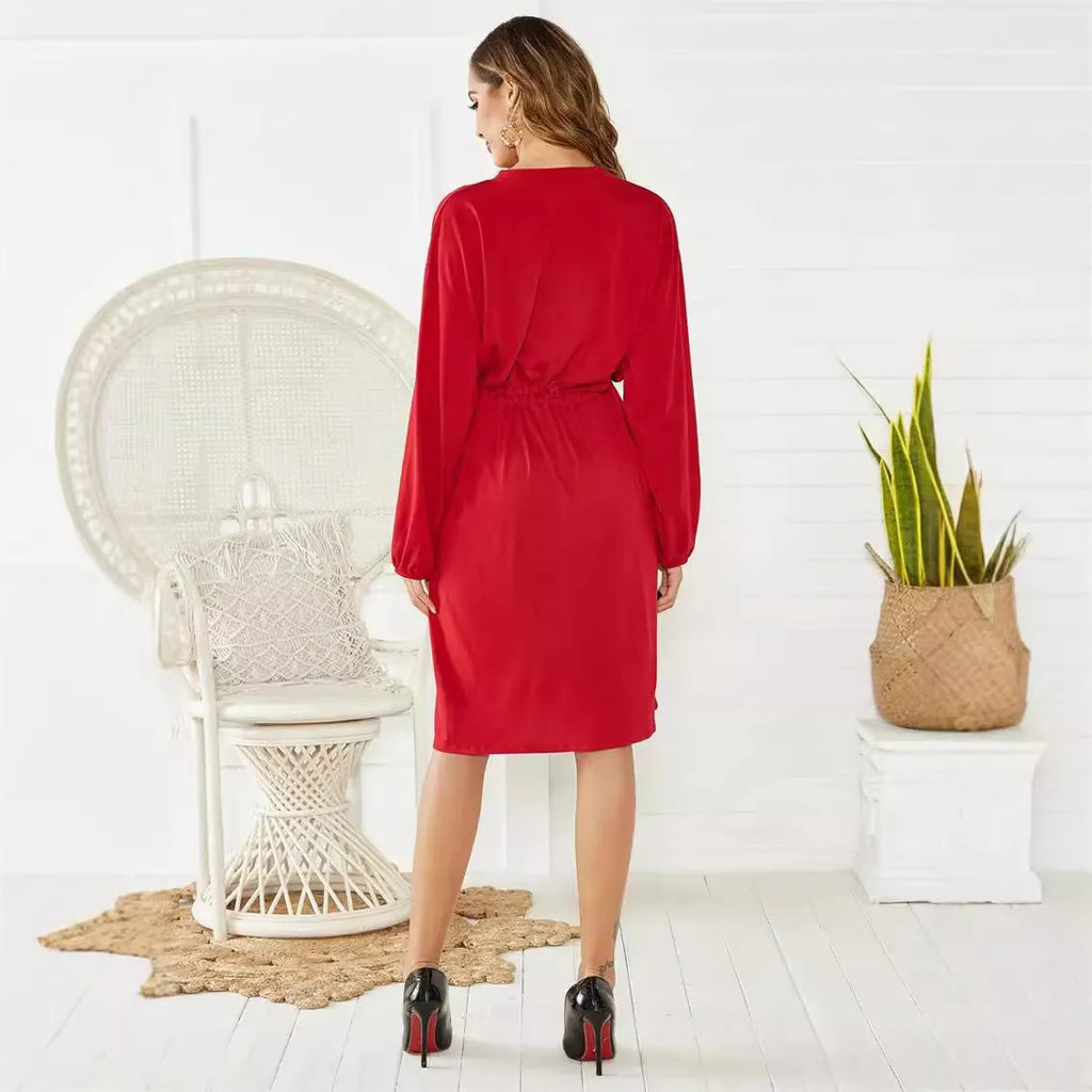 Loose elastic belt cinched short dress in solid black or red with long sleeves and A-line skirt