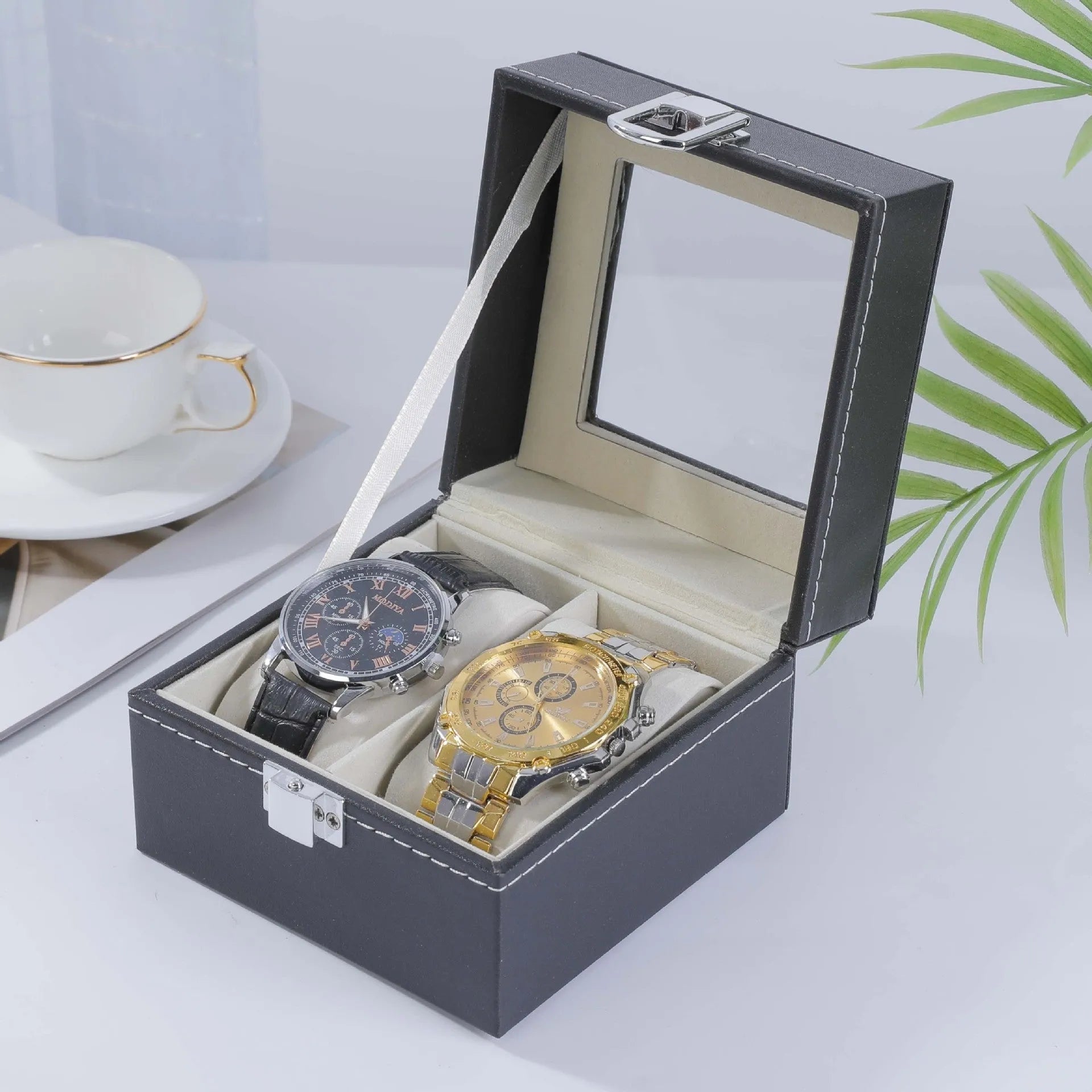 Grey high-grade leather watch storage box with transparent dustproof lid showing internal watch slots