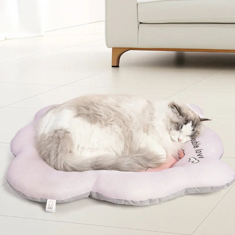 Green pet cooling mat for dogs and cats with ice silk surface and waterproof base.