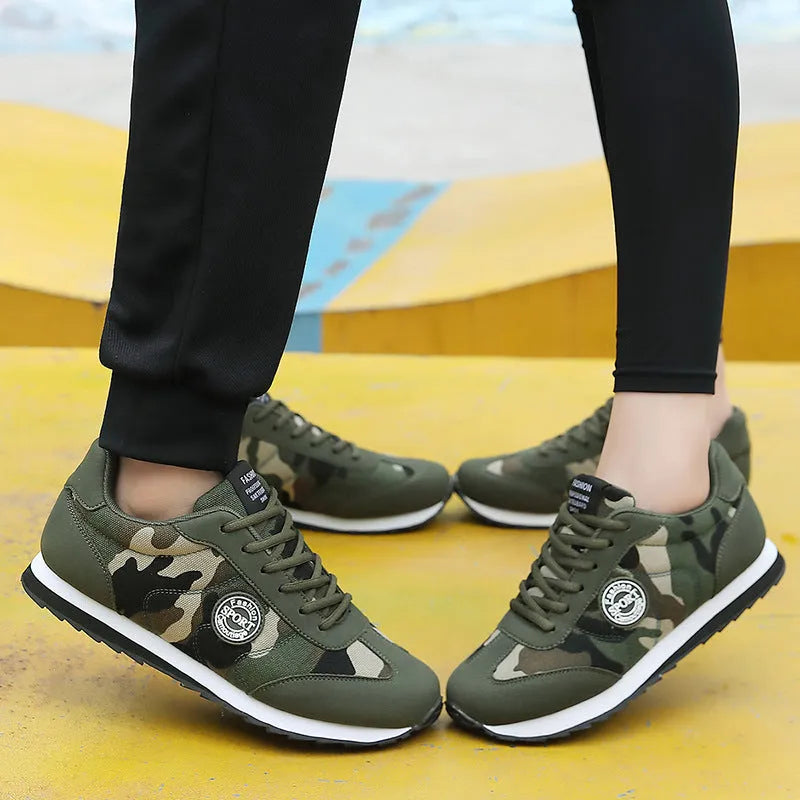 Green camouflage suede low-top sports shoes with a flat foam sole and mesh lining.