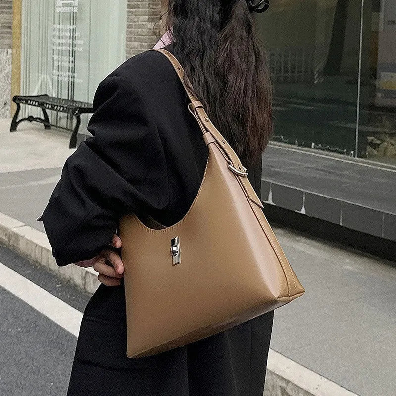 Genuine leather crossbody shoulder bag in dumpling shape with organised compartments