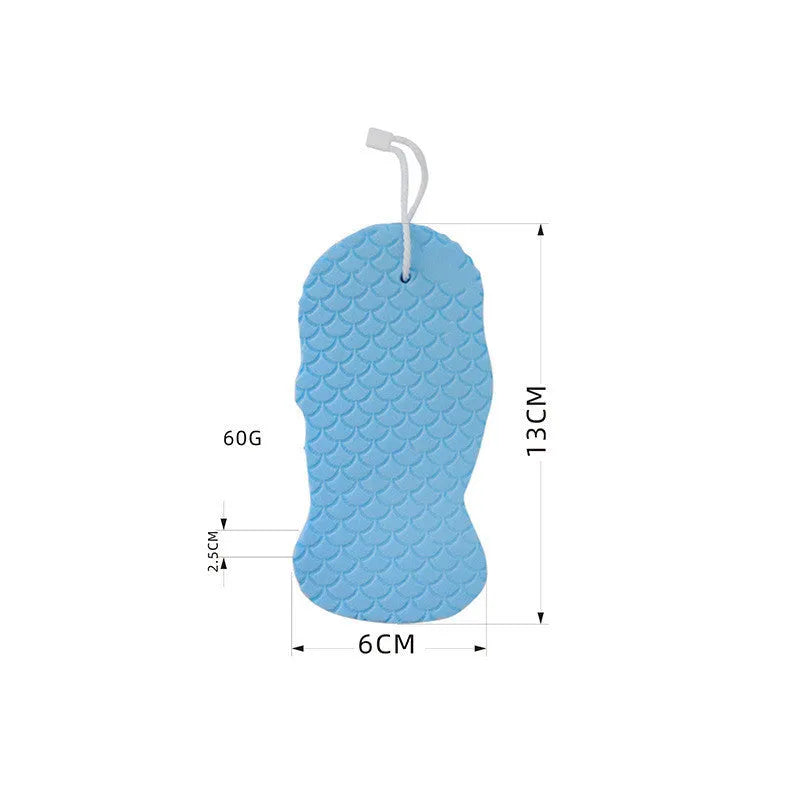 White 3D fish scale pattern bath sponge ball with hanging loop on a grey background.