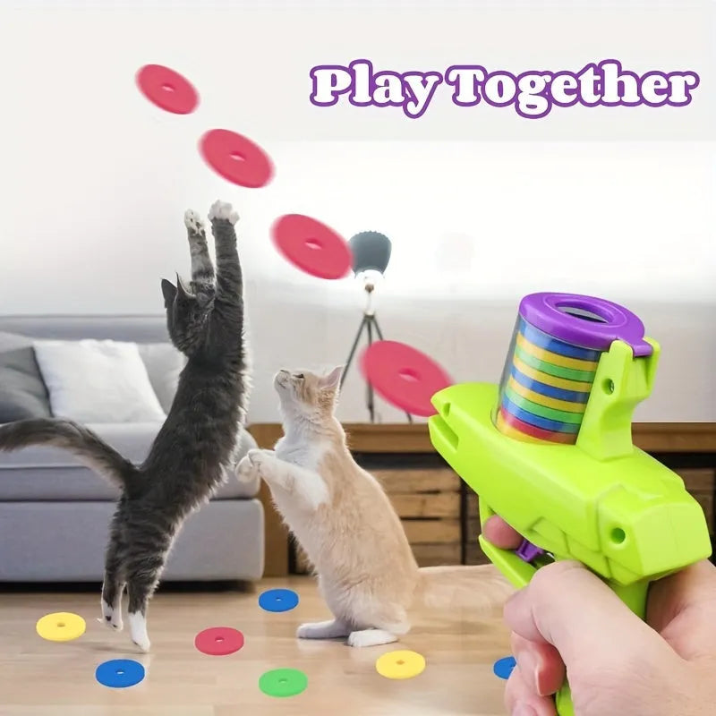 Green or purple durable plastic battery-free cat toy launcher with foam discs for interactive play
