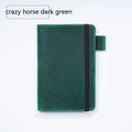 Handmade cowhide kraft notebook open showing wood-free paper with dark green cover option