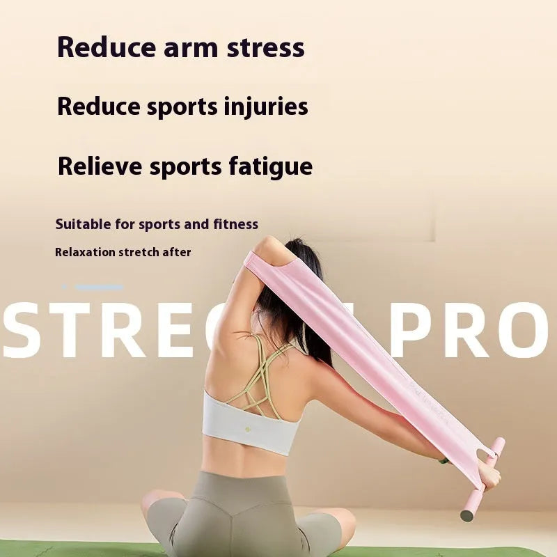 Grey and pink yoga stretching tool for shoulder, back, and hip flexibility exercises.