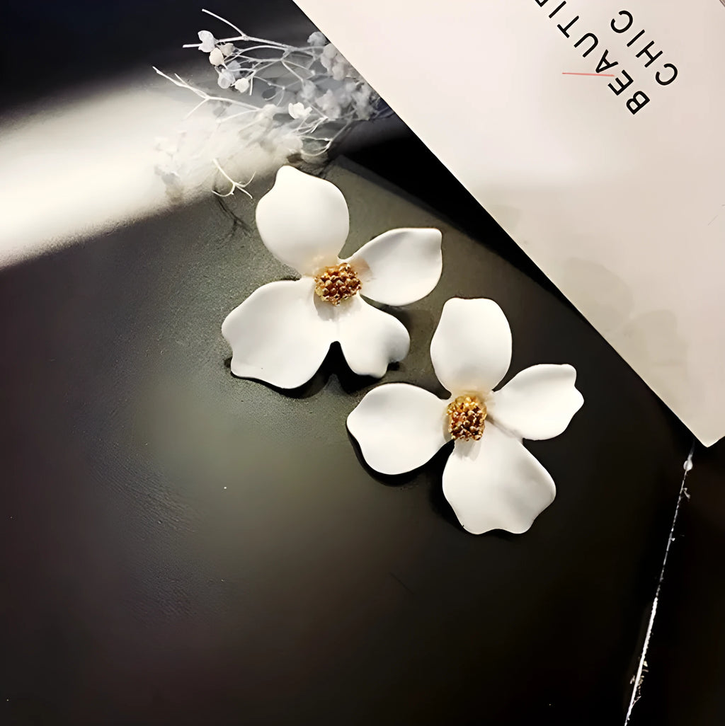 Flower-shaped stud earrings for women in white and pink colour options
