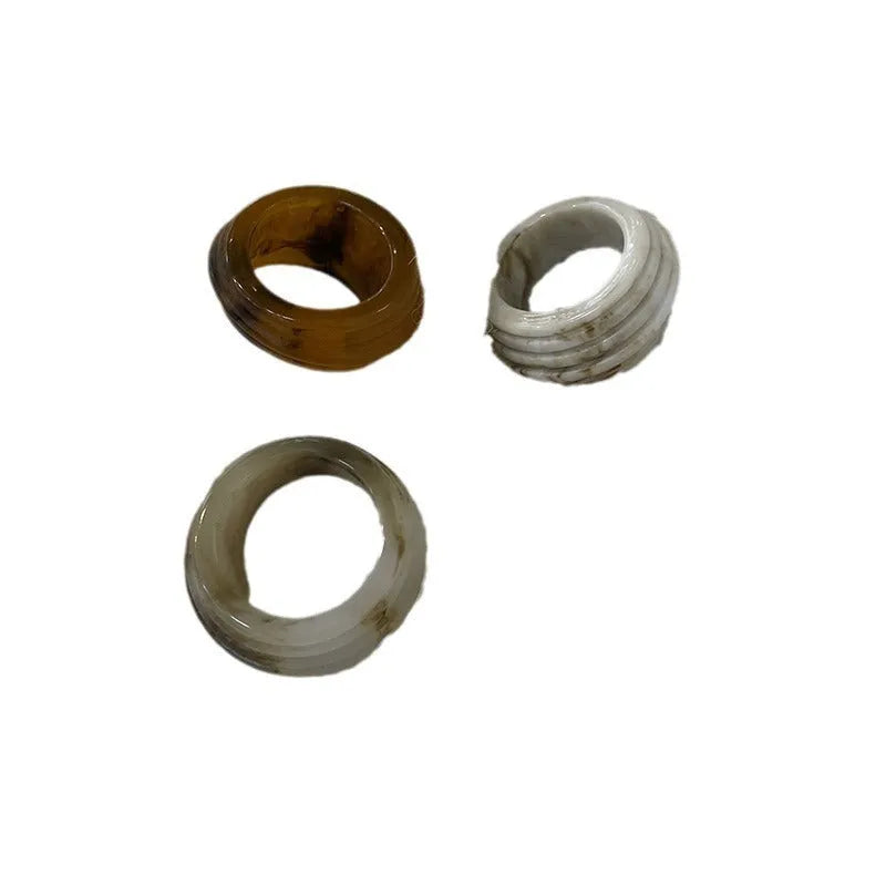 Geometric resin wide ring with irregular shape in retro Chinese style showing earthy colour options