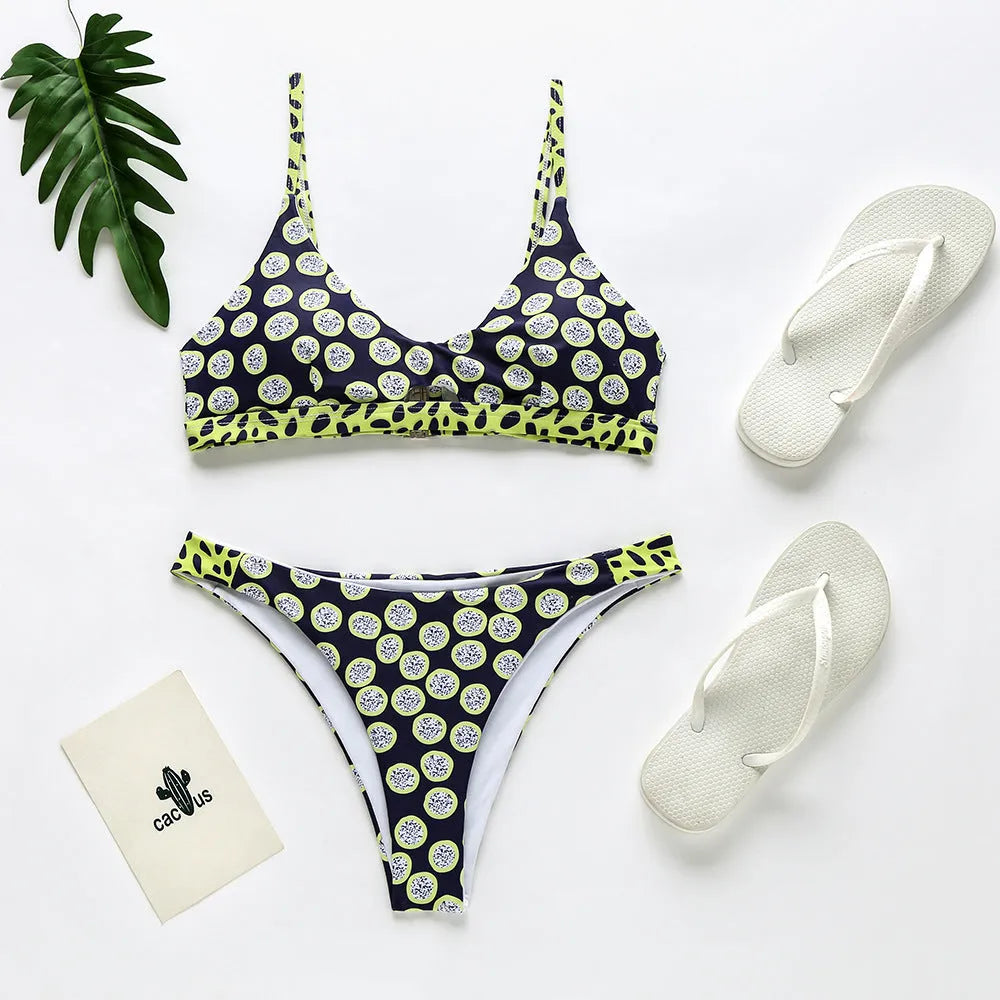 Women's polyester bikini swimsuit with choice of black and white dots or red and white stripes pattern