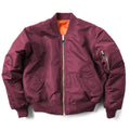 Men's army green American workwear style cotton-padded nylon jacket with a loose fit on a hanger.
