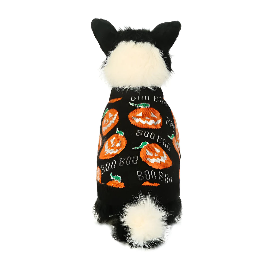 Black dog sweater with a large orange Halloween pumpkin print on the back.