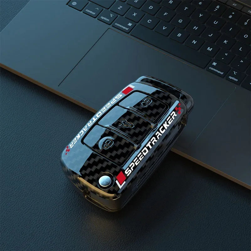 Carbon fibre style car key cover with mirror element in carbon black and white colours