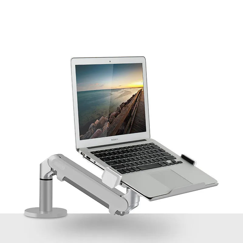 Silver aluminium laptop stand with adjustable air pressure arm bracket elevating a laptop