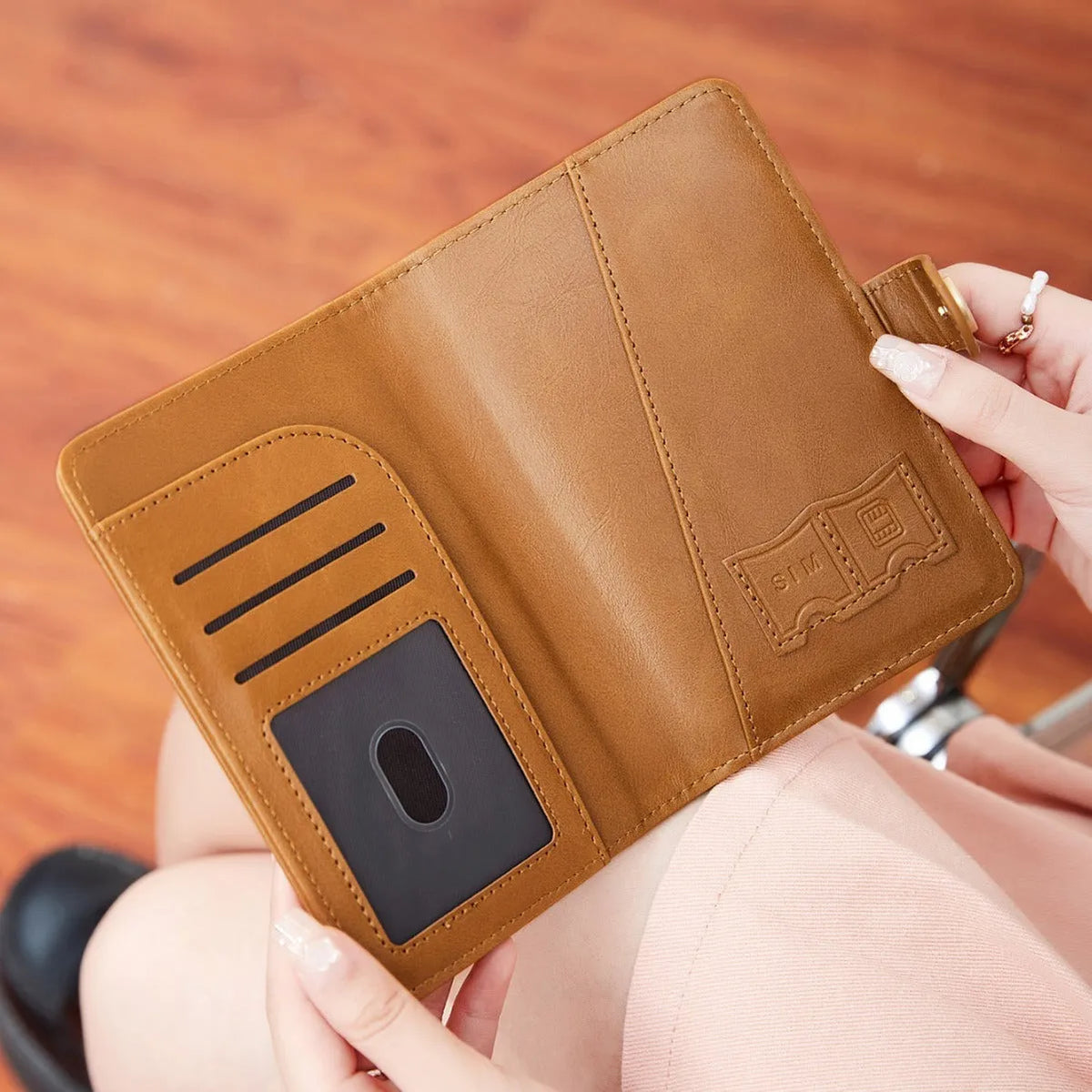 PU leather passport holder wallet with RFID blocking in multiple colour options showing compartments and sewing detail