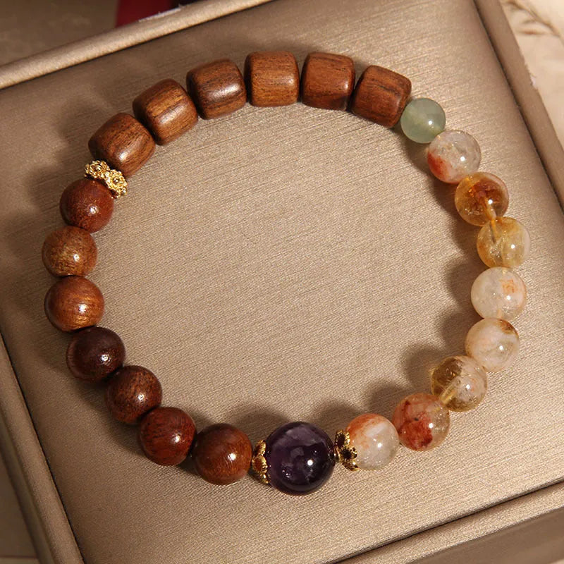 Women's bracelet with yellow tower crystal, ebony amethyst beads, pearl and rhinestone accents