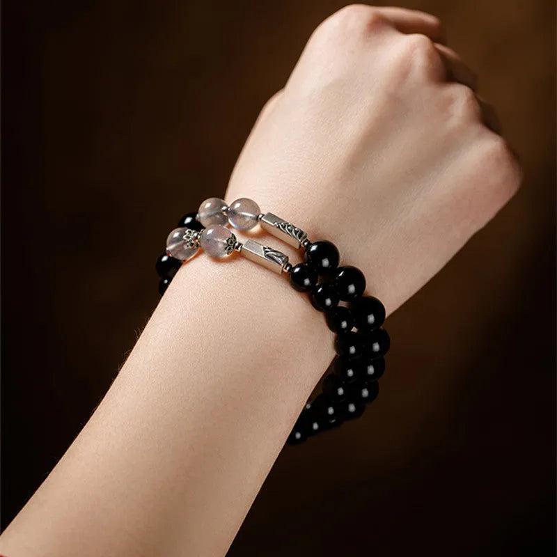 Black obsidian bead bracelets showing 8mm and 10mm sizes for couples in national style