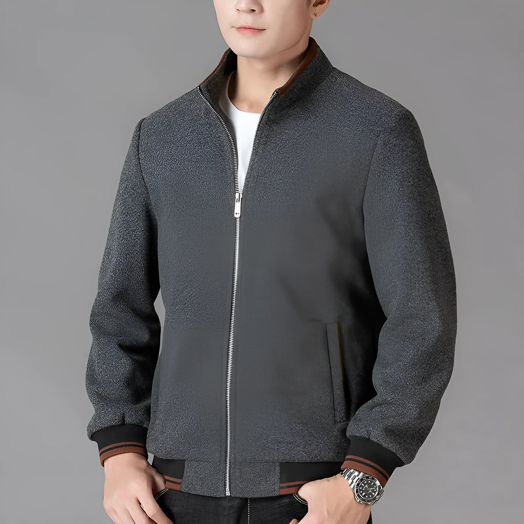 Men's grey sports-style fleece jacket with long sleeves and a stick pocket