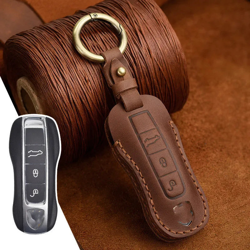 Genuine leather Porsche key case with retro bag buckle in blue and brown colour options