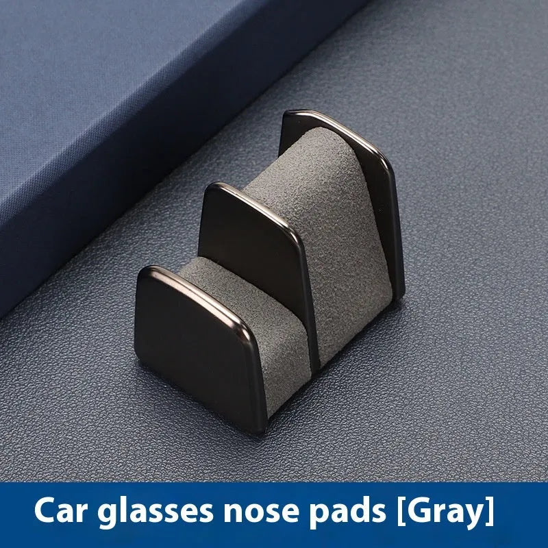 Car dashboard glasses holder in zinc alloy with leather trim, measuring 3.7x3.2x2.5cm