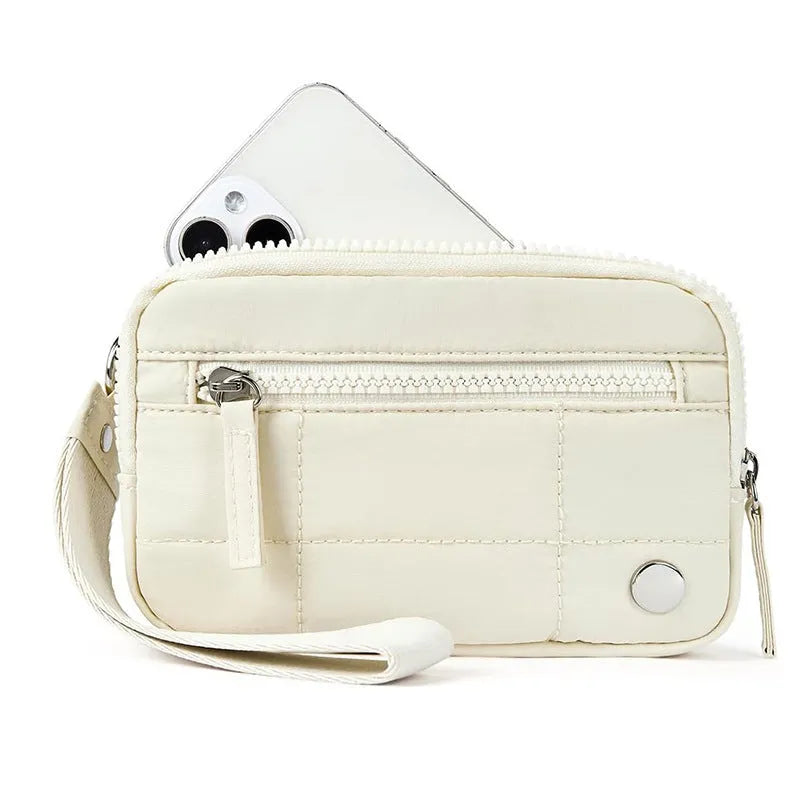 Women's waterproof quilted nylon handbag with transparent deck in beige colour