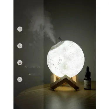 Lunar-shaped humidifier night light with 13cm diameter PVC ball, showing clean white LED illumination