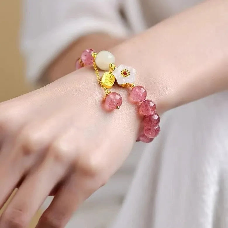 Handmade strawberry quartz crystal bracelet with Hetian jade peach blossom charm for women