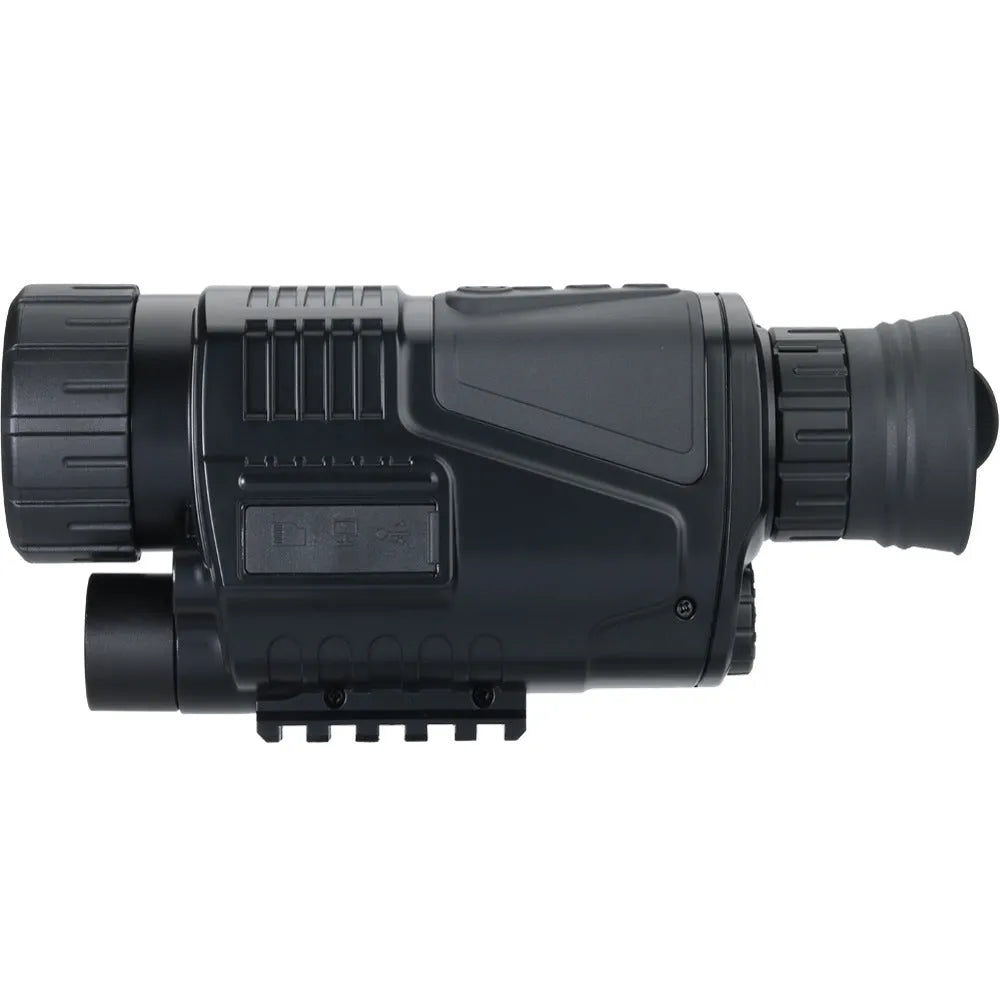 Black infrared digital night vision telescope with camera lens, rubber grip, and wrist strap on a table.