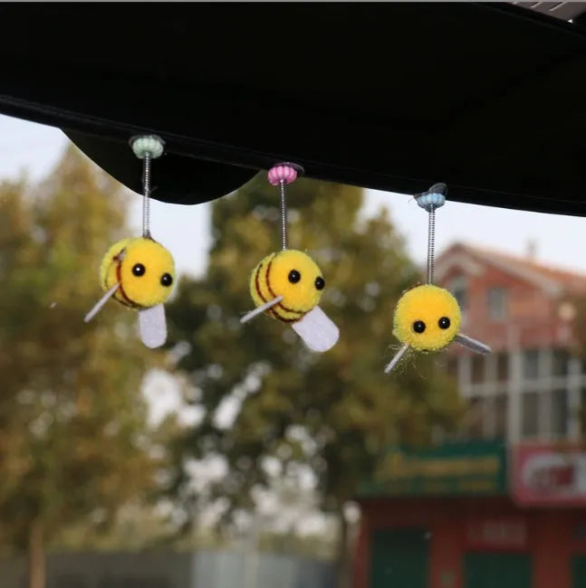 Swing Spring Bee car decoration ornament with cartoon design measuring 3x3 cm
