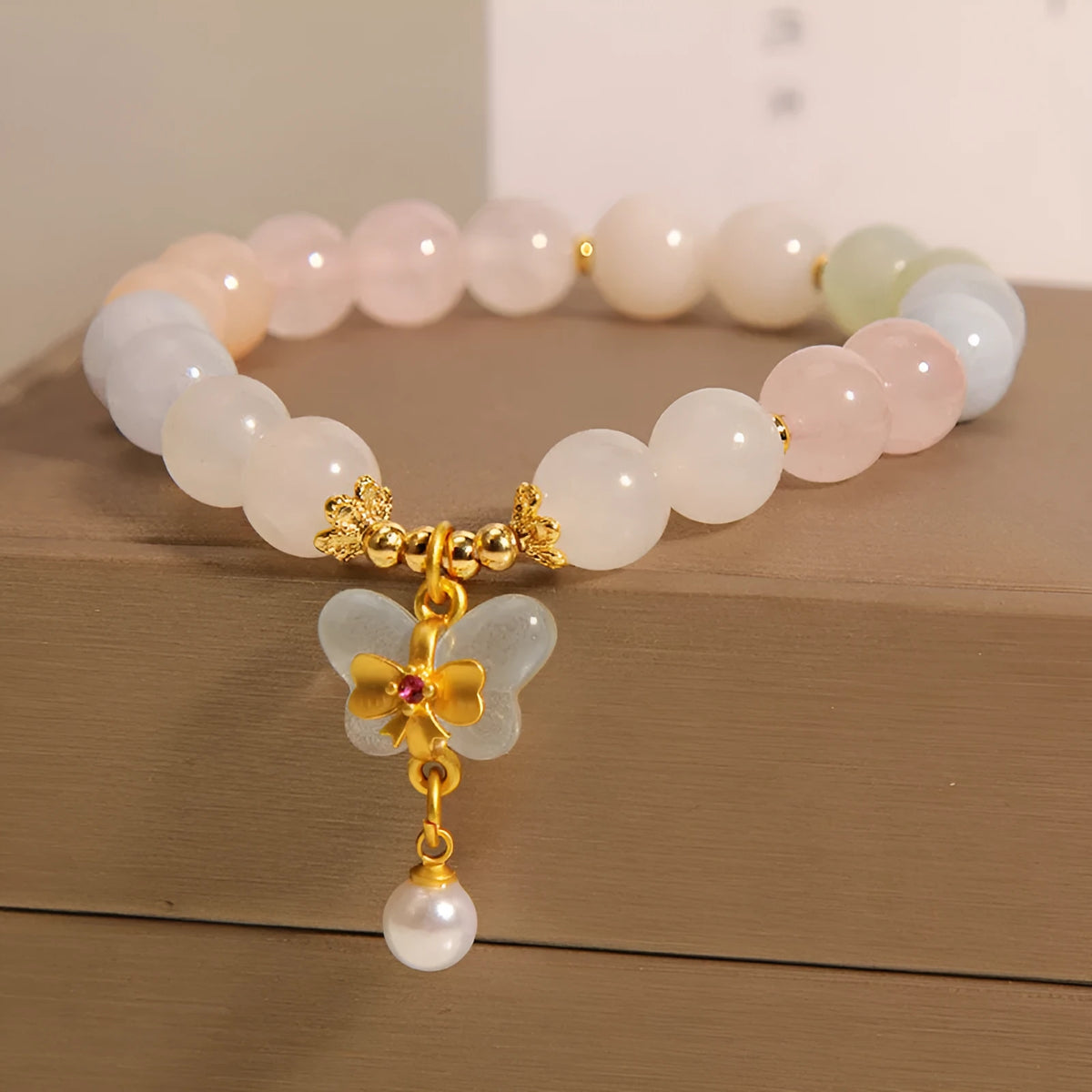 Crystal bracelet with colourful Morganite butterfly pendant in candy colours