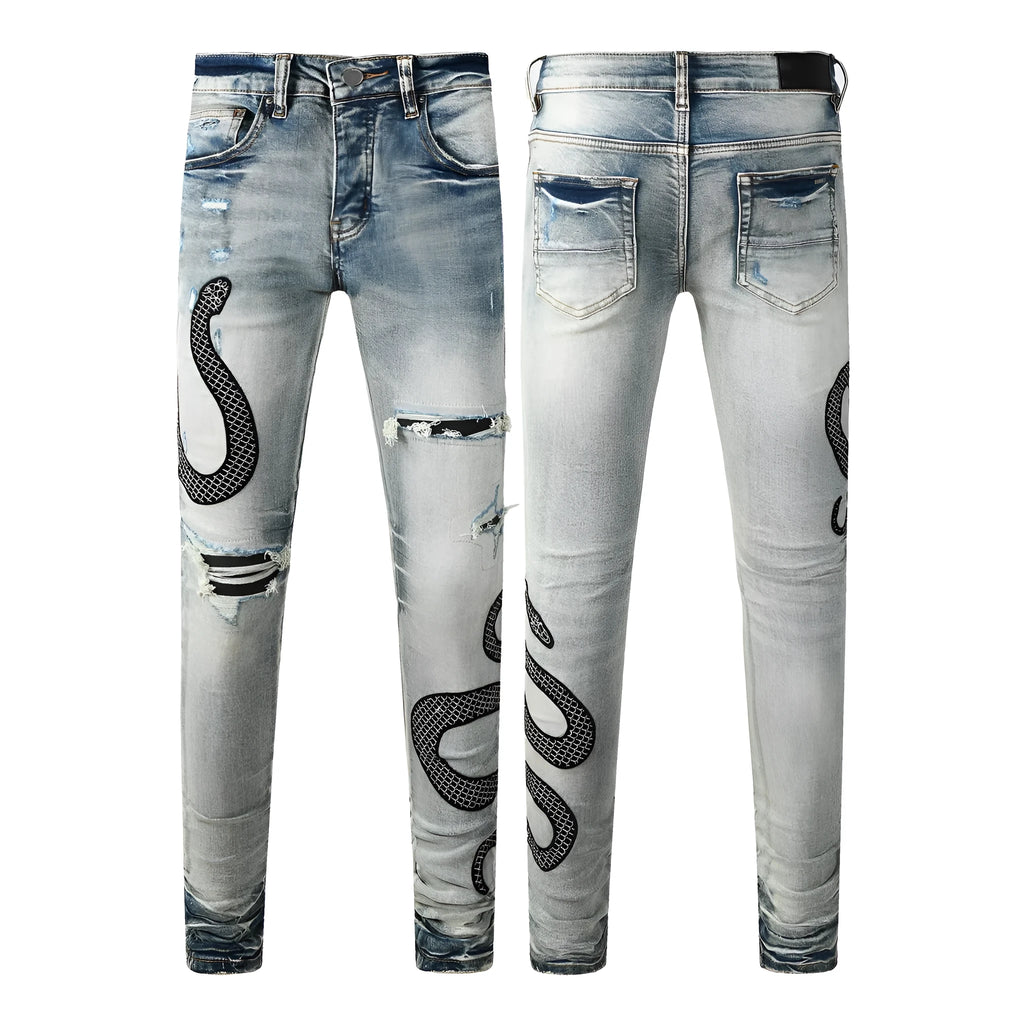 Distressed blue skinny jeans with tapered leg and button fly closure on mid-waist design